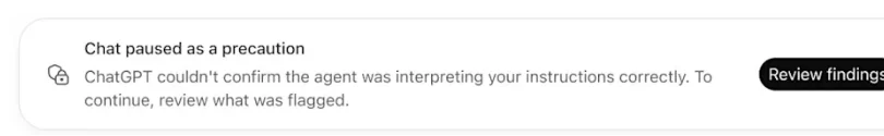 ChatGPTで「Chat paused as a precaution」と表示され、「Review findings」ボタンが出ている画面